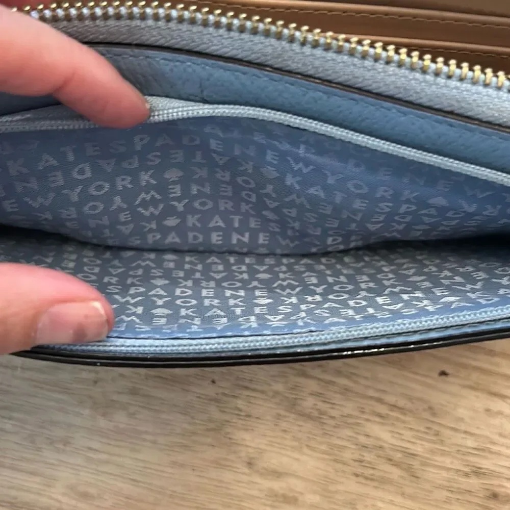 Kate spade blush wallet.